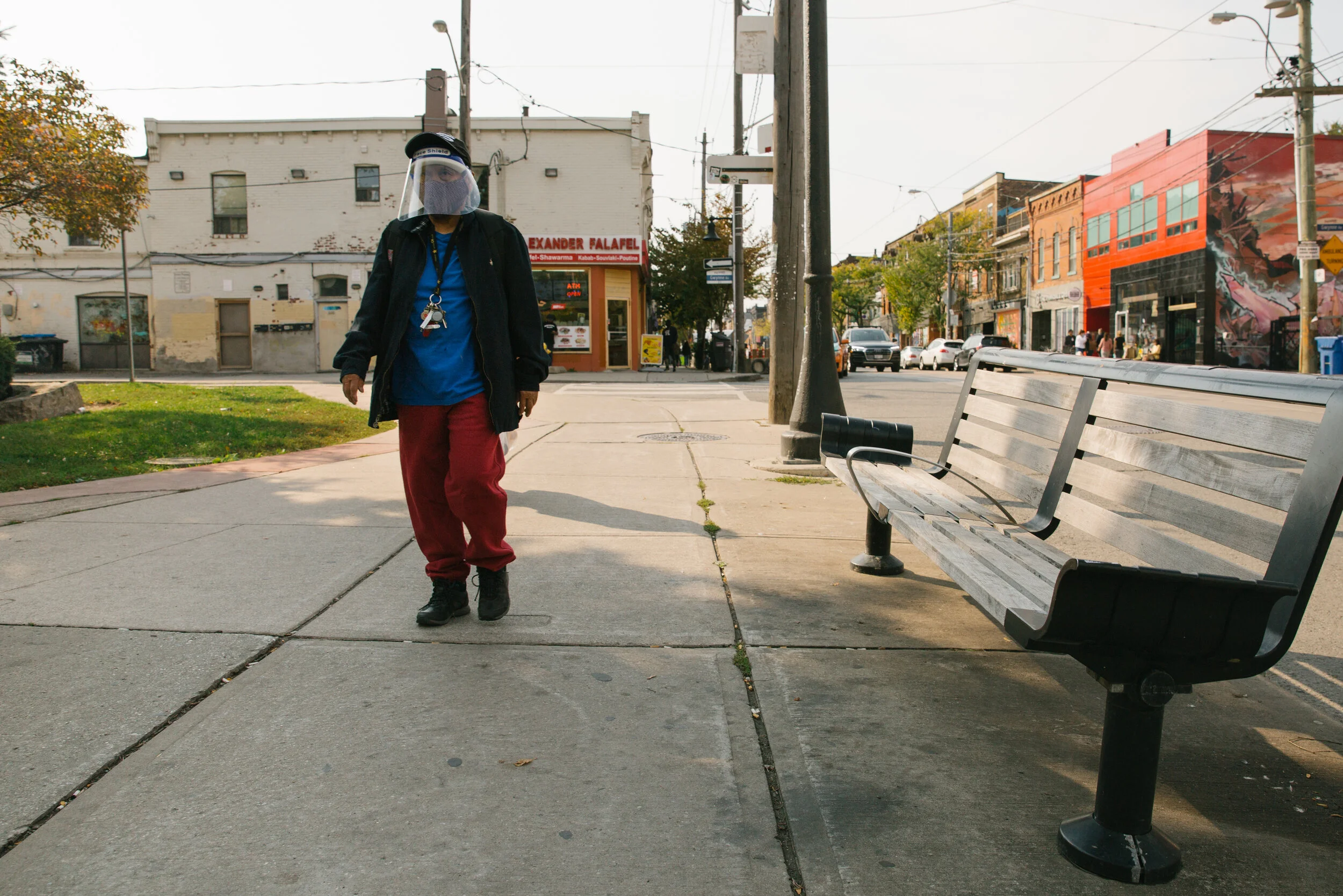 Photographed in Parkdale, a man protects his face twice by covering it with a face mask and a face shield. In these times, maintaining a normal life and carrying on with a routine takes courage and resilience. How do you work around fear to start lea